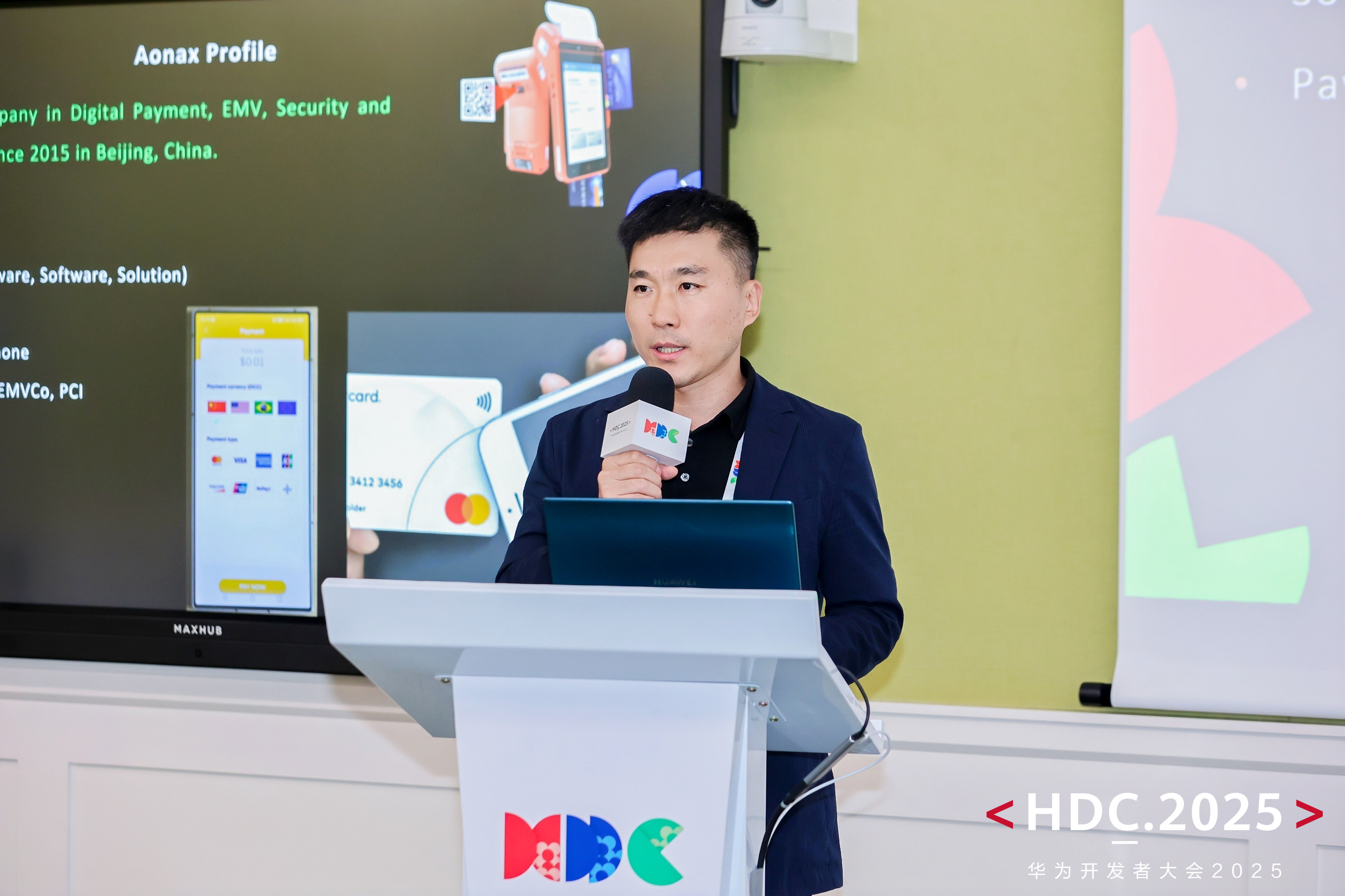 Aonax founder presenting the Aonax Profile and Wallet app on stage at HDC.2025